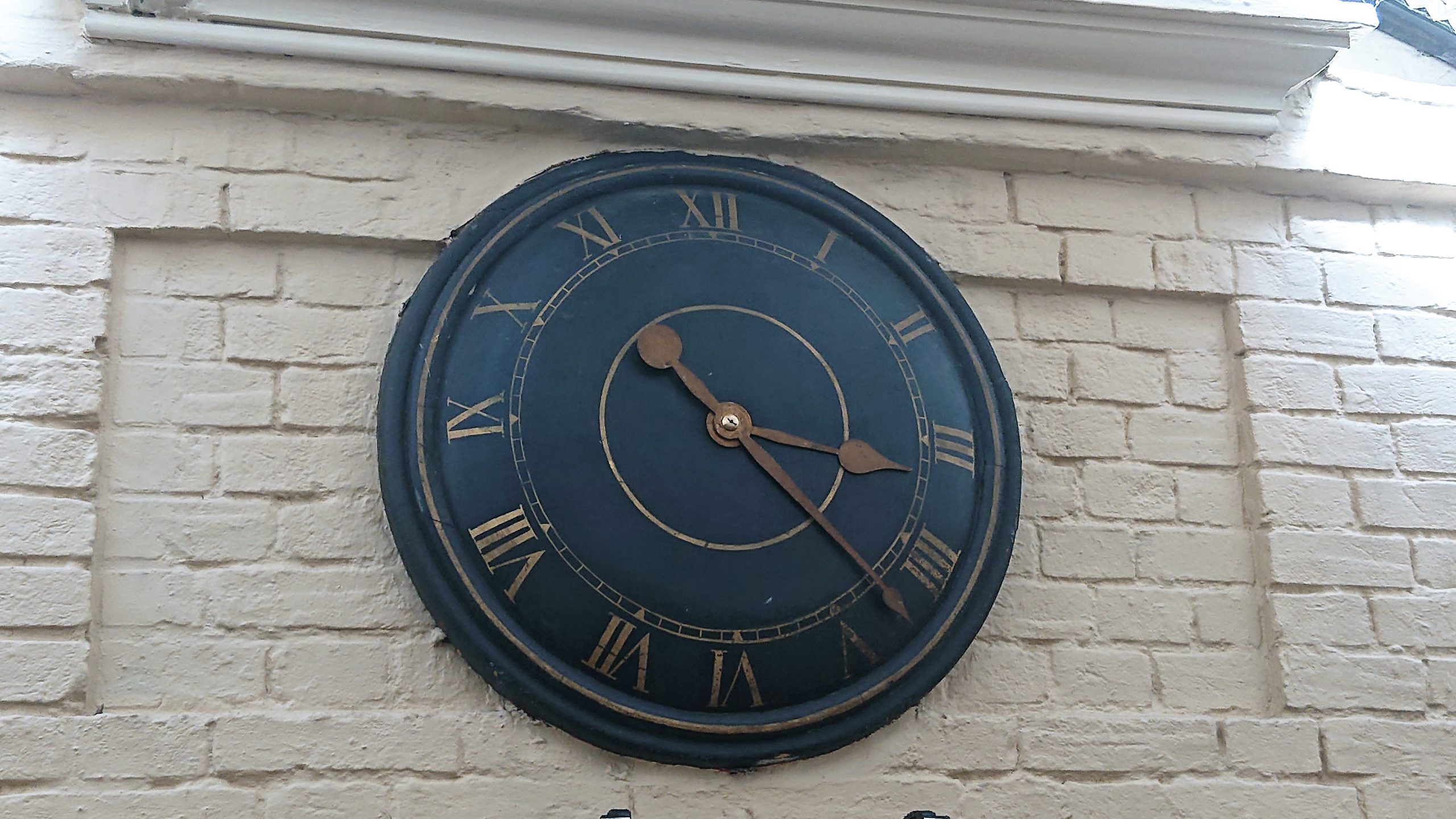 The 1850s Maids Head Wine Press Clock