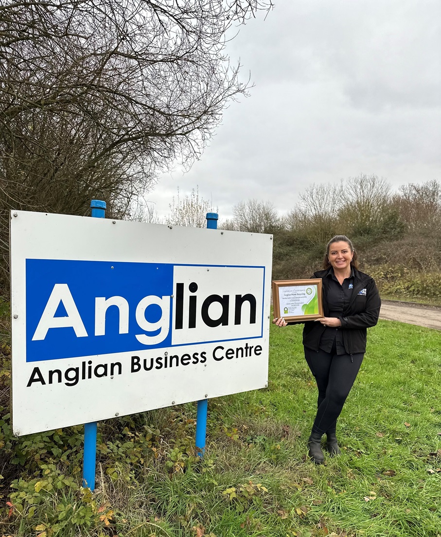 Toni Storer, director at Anglian, with the Green Apple commendation which has been presented to Anglian