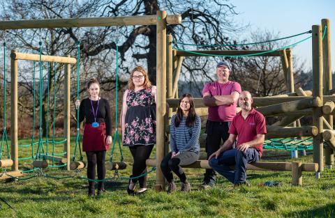 Freebridge’s Placeshaping Team with Monks Close resident Charlotte Beck at the new play area at Monks Close.