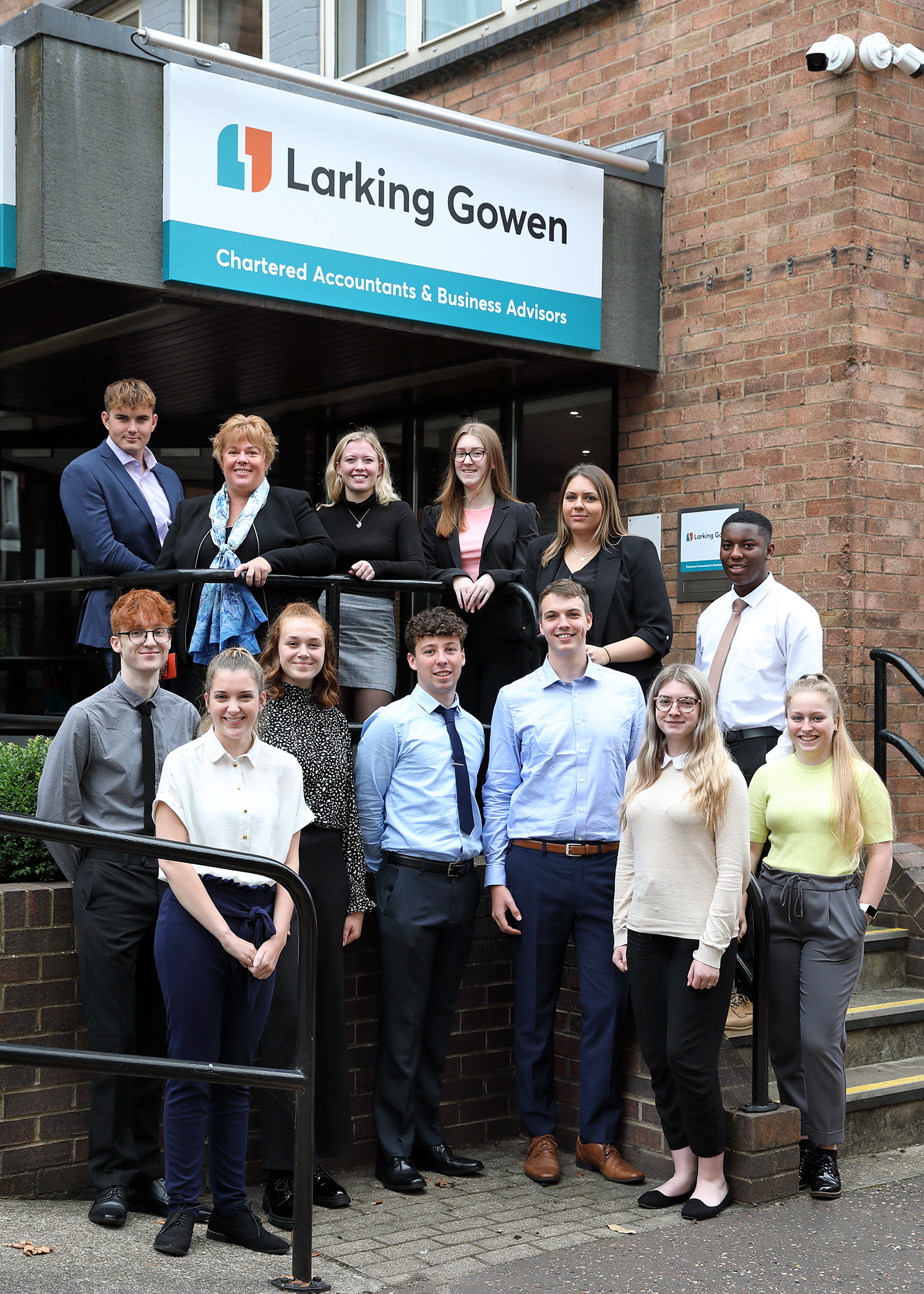 Larking Gowen Managing Partner, Julie Grimmer,] with 15 of a total of 33 new trainees, who will work across the firm’s offices in Norfolk and Suffolk to gain their professional accountancy exams