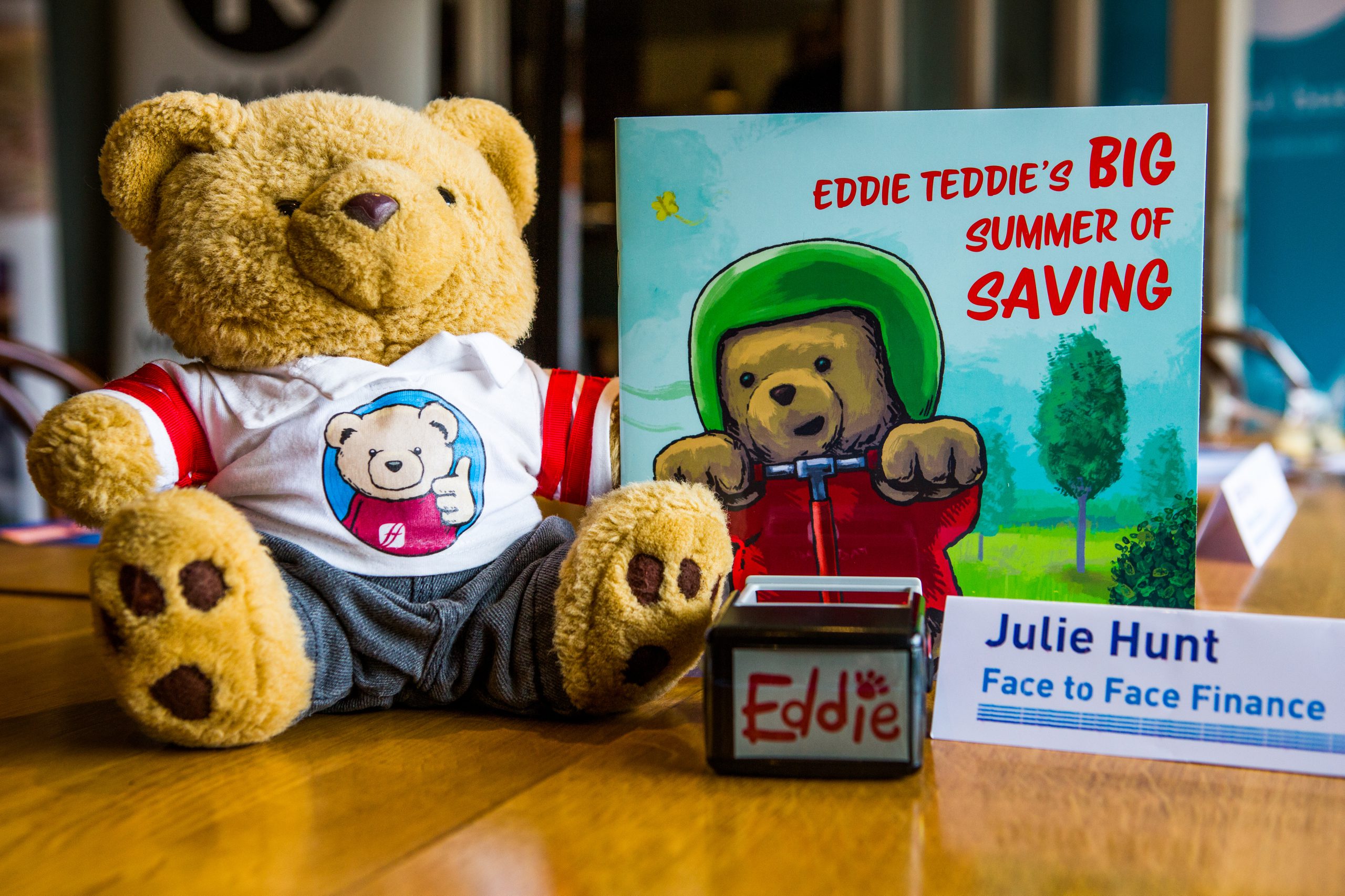 Eddie Teddie with his book