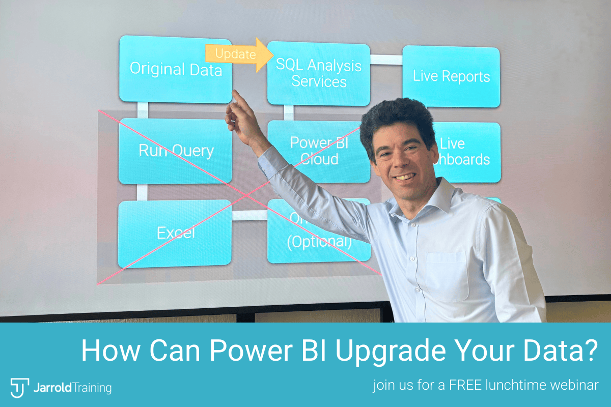 Trainer Charlie pointing at a slide about PowerBI