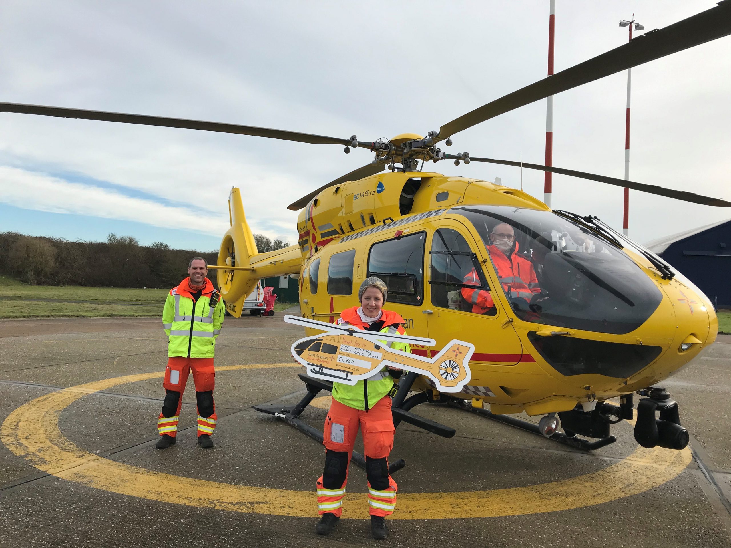 Crew Of East Anglian Air Ambulance With Act Donation Cheque