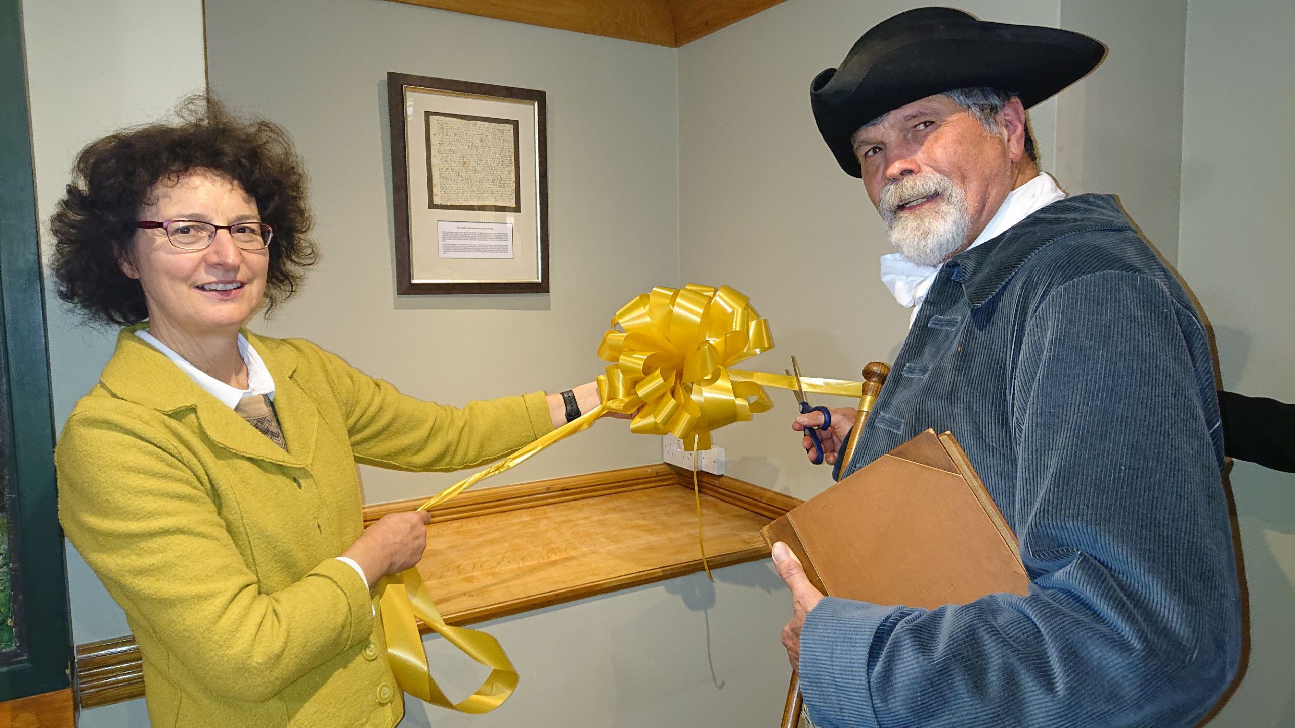 Georgina Postlethwaite, Sales Manager, Maids Head Hotel with Sir John Fenn (Rob Knee, Paston Heritage Society) unveiling the Maids Head Paston Letter