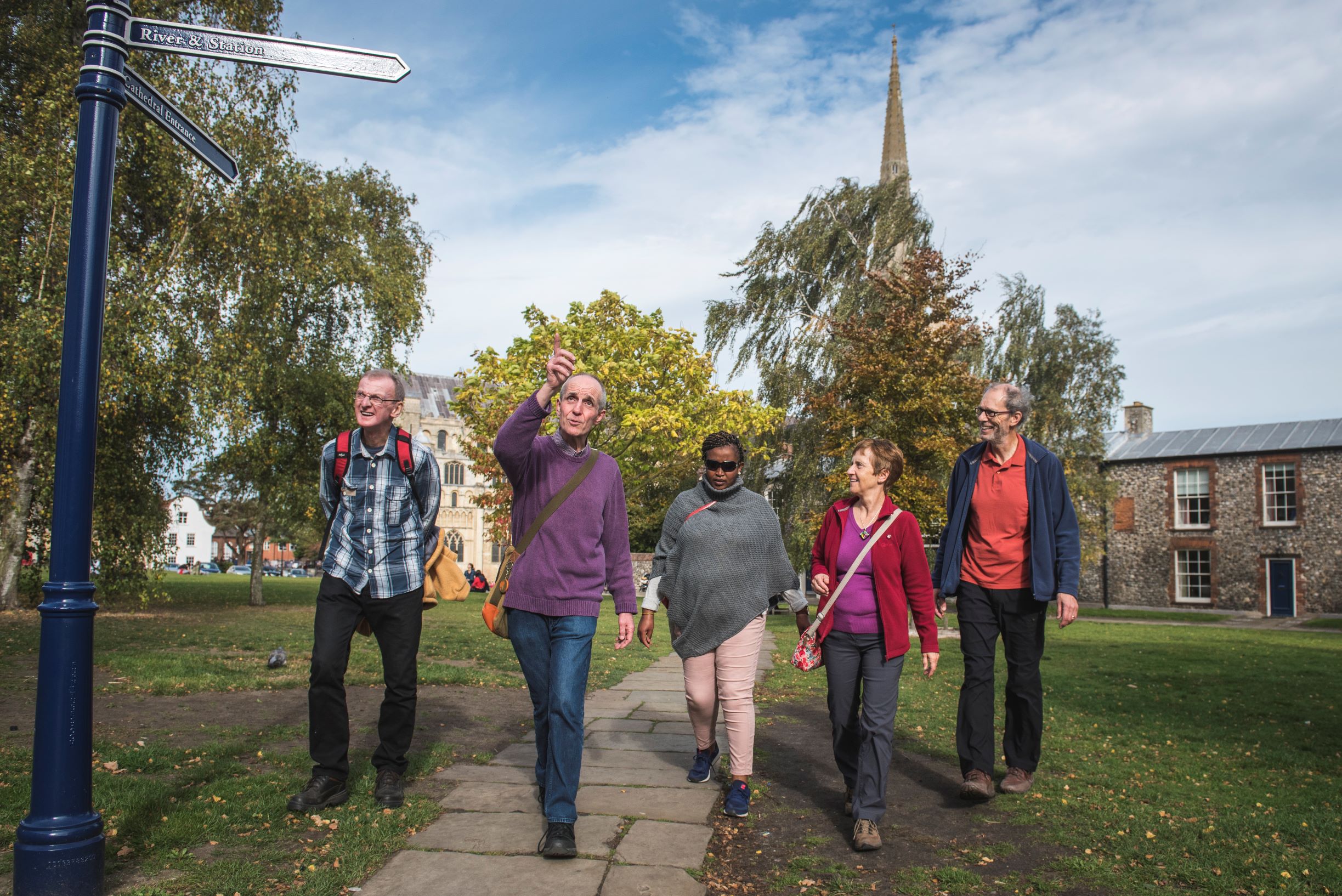 Paul Dickson leading the Rails Trails and Sails Tour in Norwich Cathedral Close