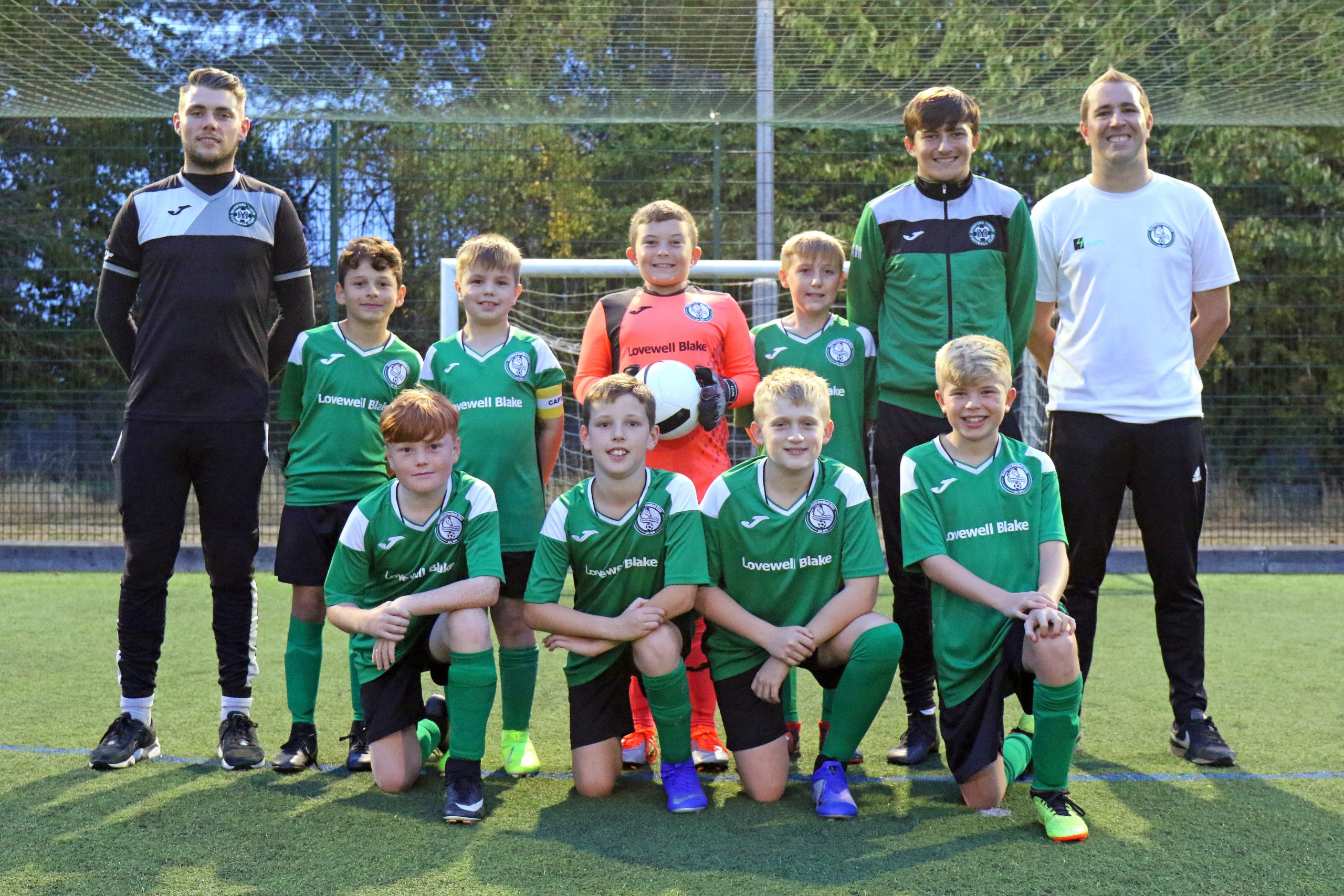 Nm Horsford Fc Under 11s Team With Coach Chris Egmore Right.jpg