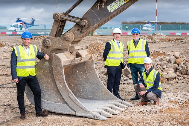 BREAKING GROUND: Work officially starts on building a new £7 million hangar for KLM UK Engineering at Norwich Airport. From left, James Shipley of KLM UK Engineering,  Richard Pace, Managing Director of Norwich Airport, Peter van der Horst, Managing Director, KLM UK Engineering, and James Walters, Development Surveyor at Rigby Group plc.