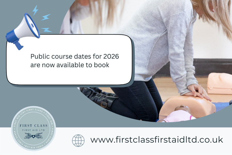 A woman is performing CPR on a training manikin