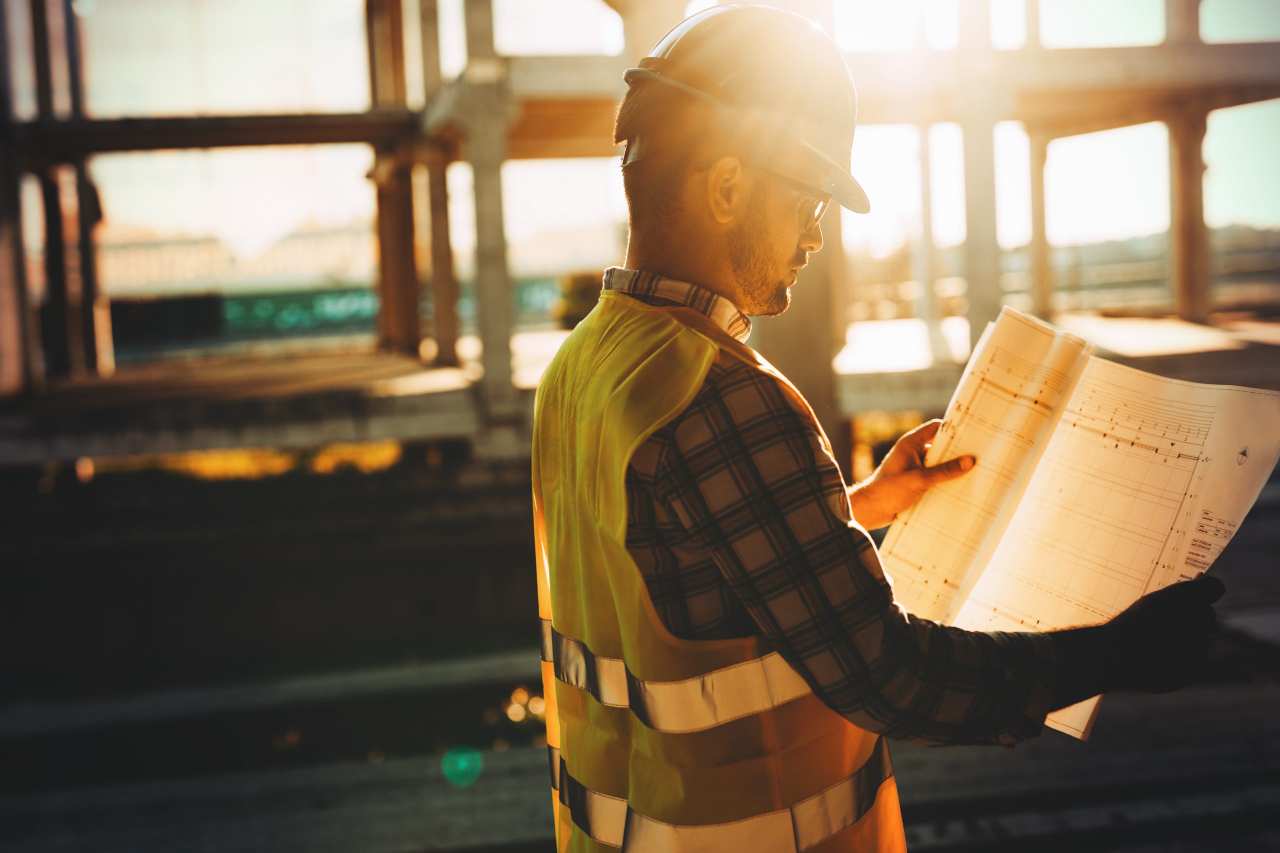 Nm A Builder Looking At Some Plans.jpeg