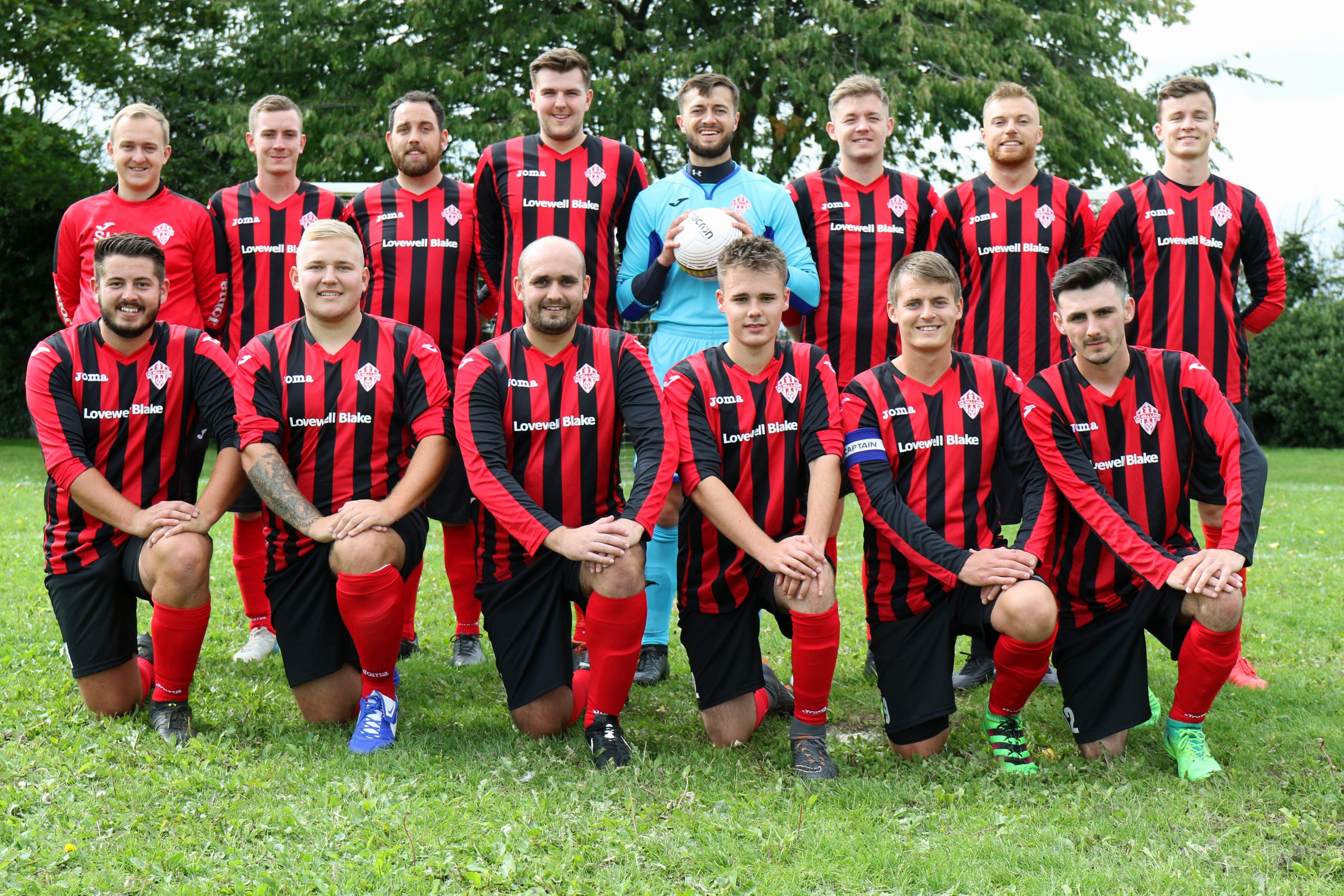 Nm Ac Mill Lane First Team With Coach Steve Hemp Back Left.jpg