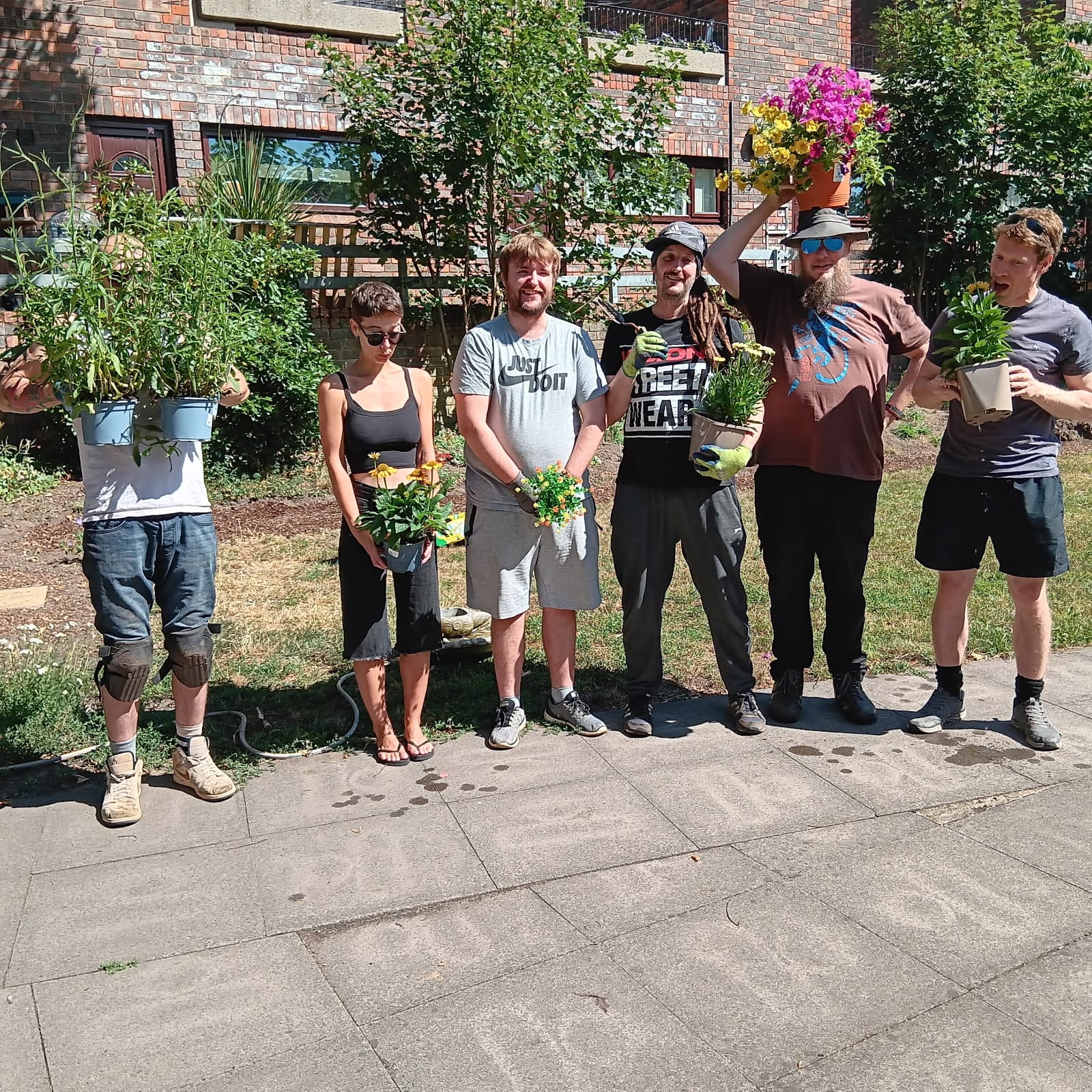 Image of participants celebrating garden project